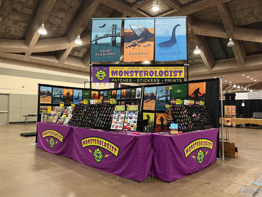 Monsterologist artist booth vendor display for pop-up events.