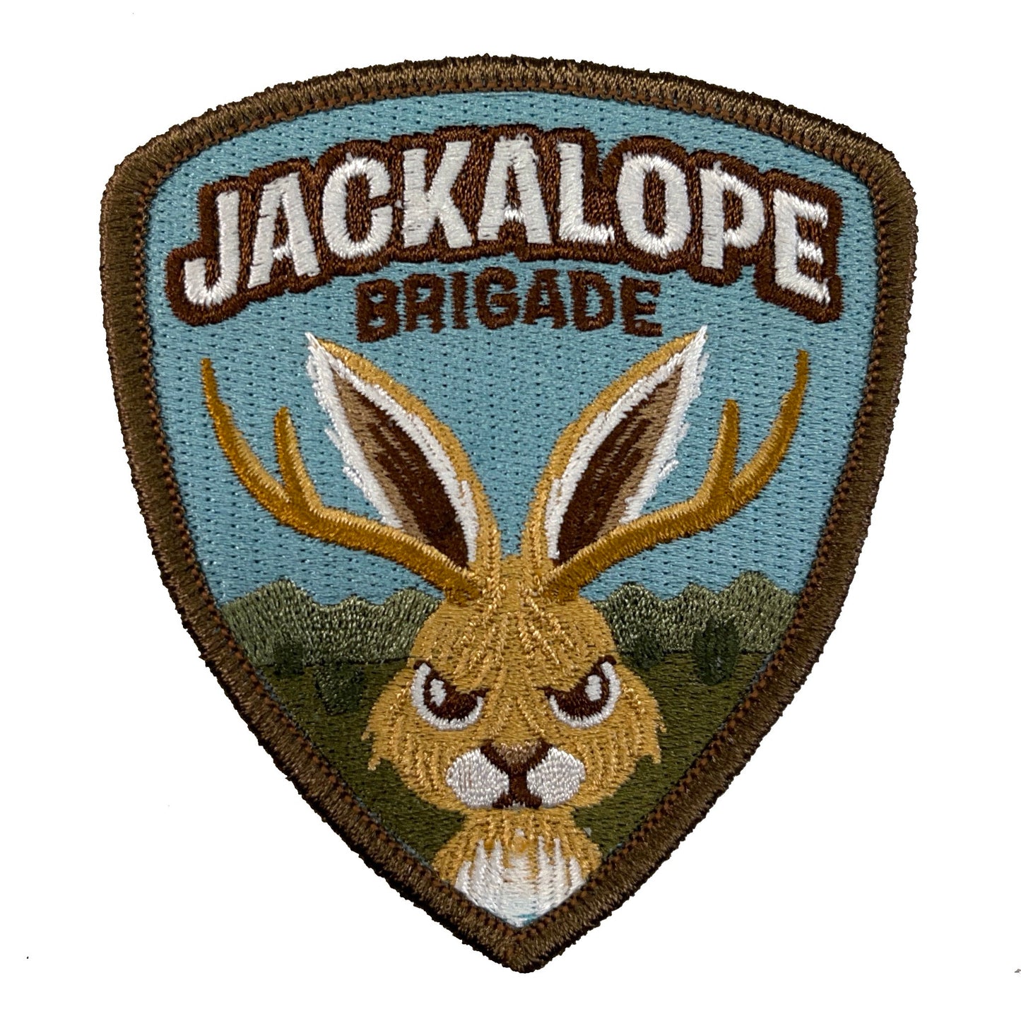 Embroidered patch with a jackalope design and 'Jackalope Brigade' text on a blue background