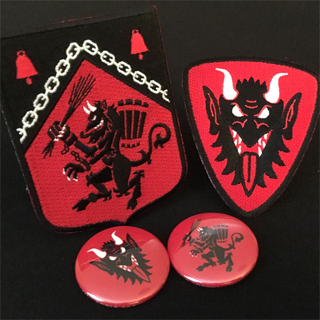 Krampus heraldic embroidered patches & pin-back buttons.