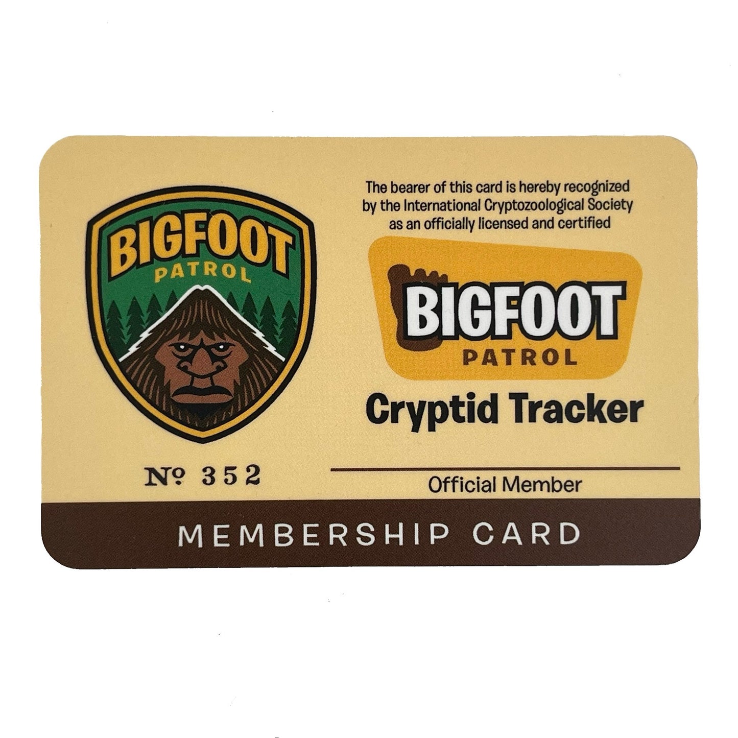 Bigfoot Patrol Cryptid Tracker membership card on a beige background