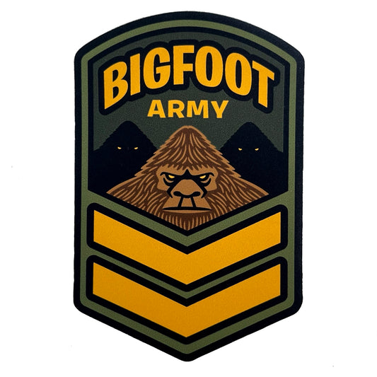 Bigfoot Army logo with a stylized Sasquatch face and mountainous background in military shield emblem design. 