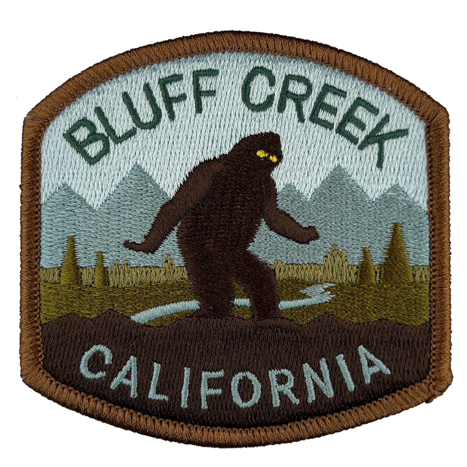 Embroidered patch with Bluff Creek, California text and a Bigfoot design.