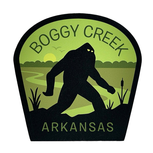 Logo of Boggy Creek Arkansas with a silhouette of Bigfoot in a green and black color scheme.