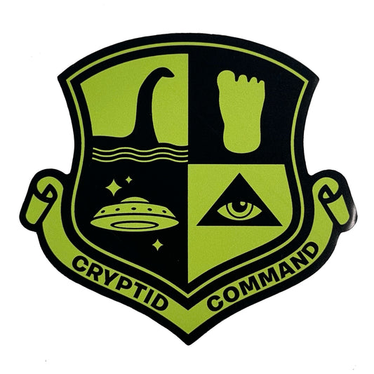 Logo of Cryptid Command with symbols of Nessie Loch Ness Monster, Bigfoot footprint, a UFO, and an eye on a military style shield badge emblem insignia shape.