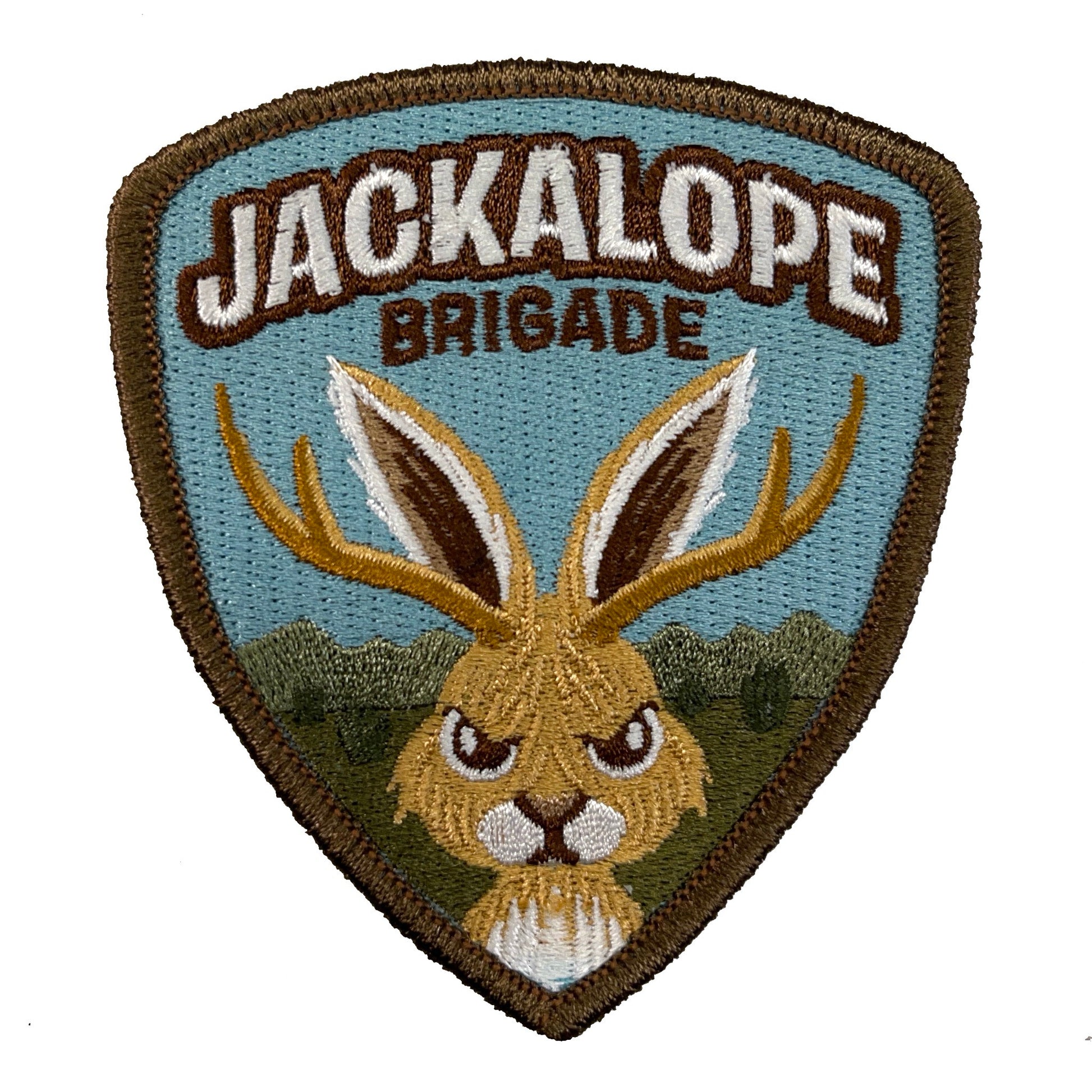 Embroidered patch with a jackalope design and 'Jackalope Brigade' text on a blue background