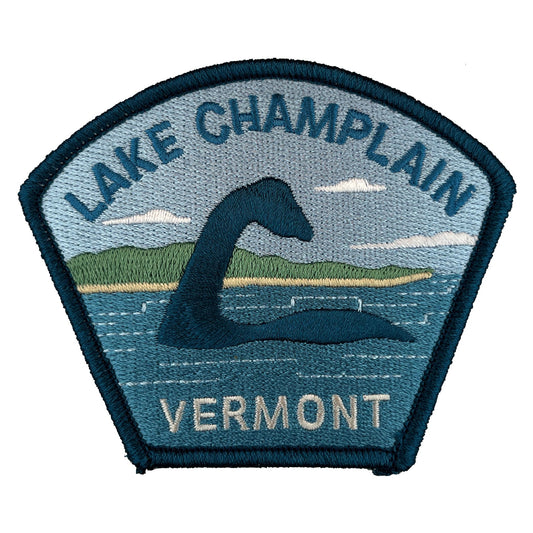 Embroidered patch of Lake Champlain, Vermont with a depiction of the sea creature cryptid "Champ".