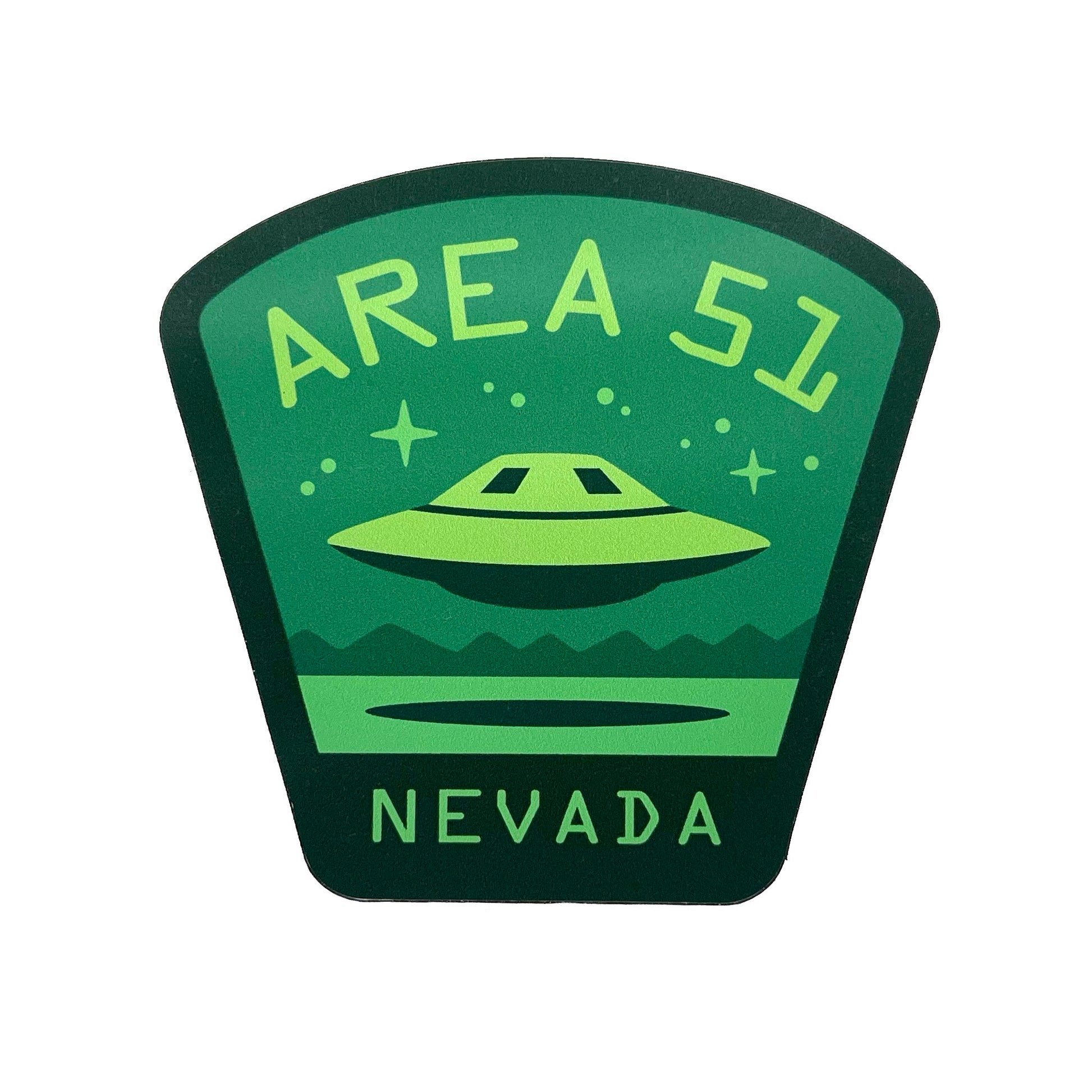 Night-vision Green and dark green magnet with UFO design and 'Area 51 Nevada' text on a white background