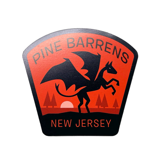Logo of Pine Barrens, New Jersey with a Jersey Devil winged creature design on a red  background.