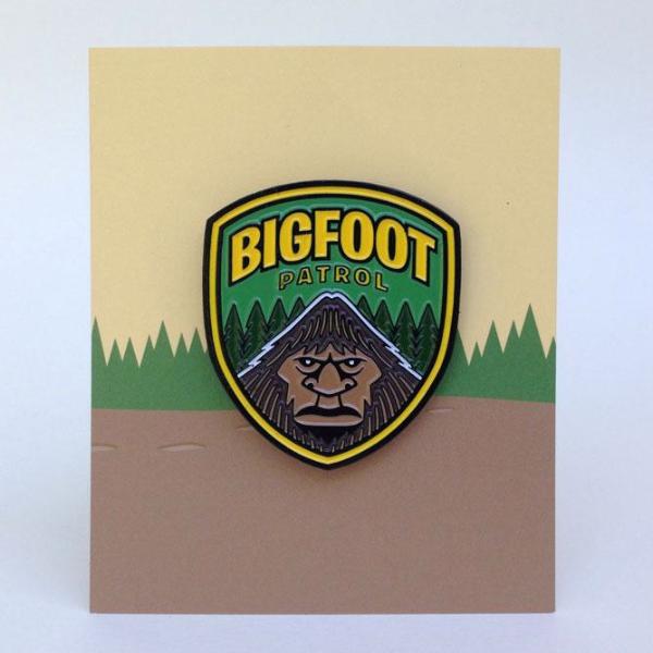 Bigfoot Patrol park ranger shield enamel pin