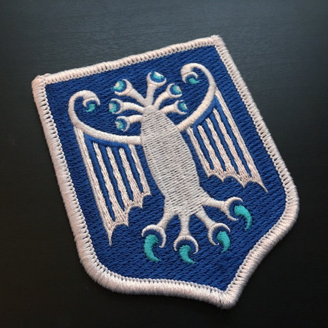 Elder Thing Antarctic variant heraldic shield embroidered patch by Monsterologist